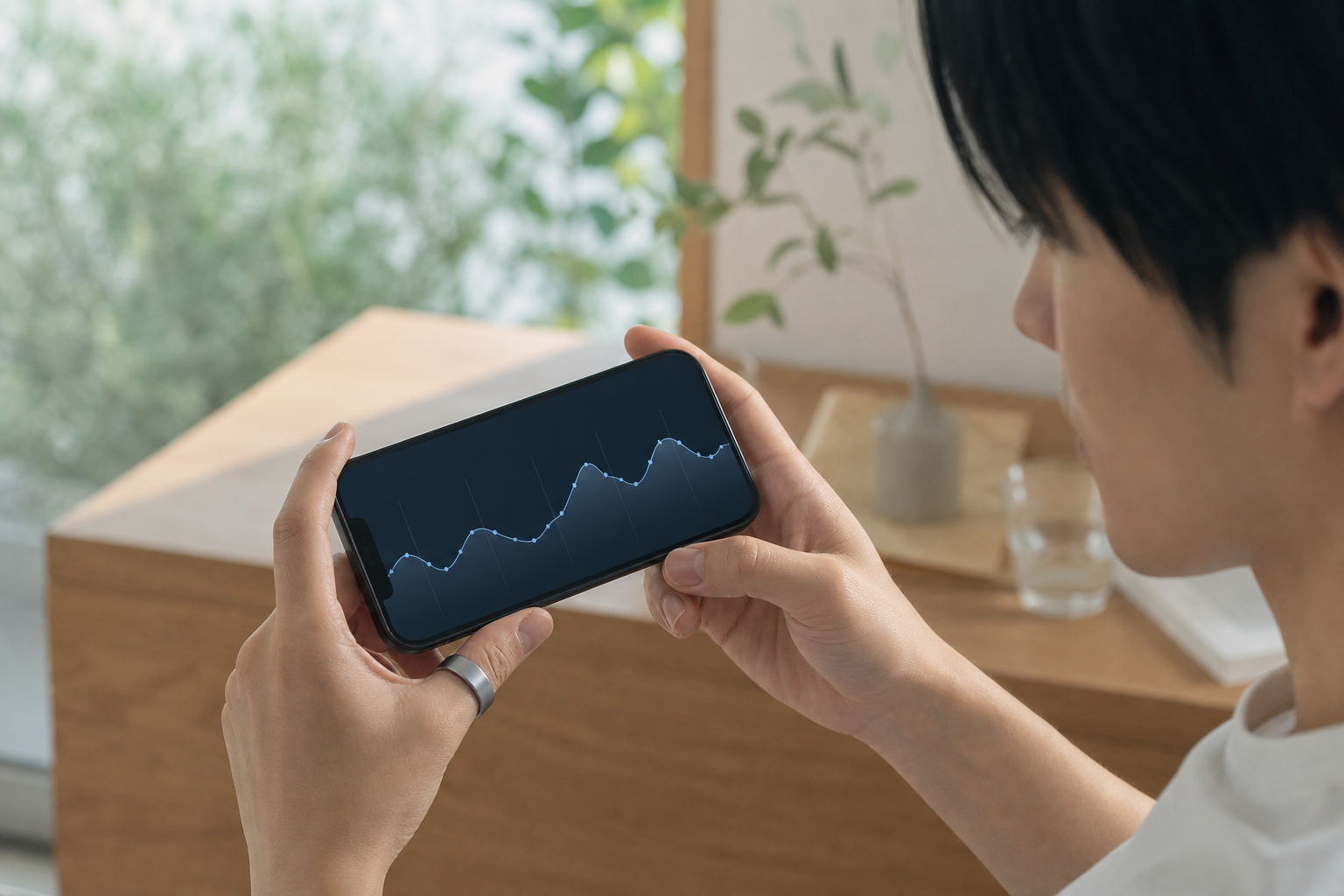 2週間のHRVトレンドグラフをスマートフォンで確認するイメージ